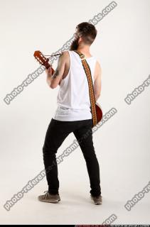 Oscar Playing Guitar