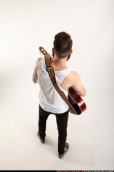 Oscar Playing Guitar