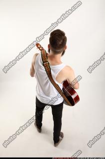 Oscar Playing Guitar