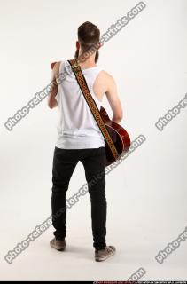 Oscar Playing Guitar