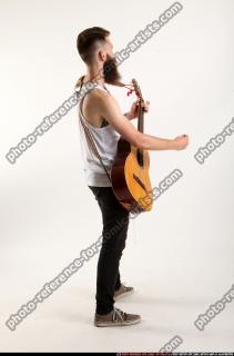 OSCAR PLAYING GUITAR 05 B