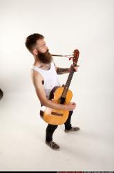 Oscar Playing Guitar