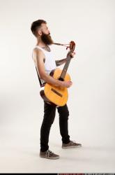 Oscar Playing Guitar