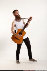 Oscar Playing Guitar