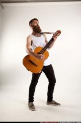 Oscar Playing Guitar