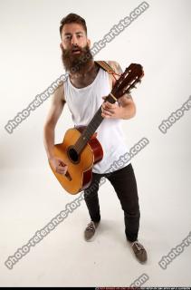 Oscar Playing Guitar