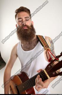 OSCAR PLAYING GUITAR 10