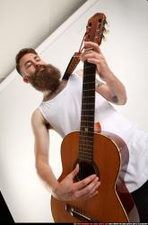 Oscar Playing Guitar