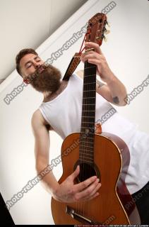 Oscar Playing Guitar