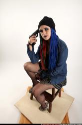 Dolores Sitting Pistol Pose