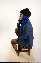 Dolores Sitting Pistol Pose