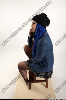 DOLORES SITTING PISTOL POSE 02 A