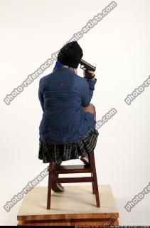 Dolores Sitting Pistol Pose