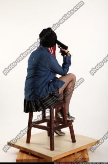 Dolores Sitting Pistol Pose