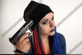 Dolores Sitting Pistol Pose